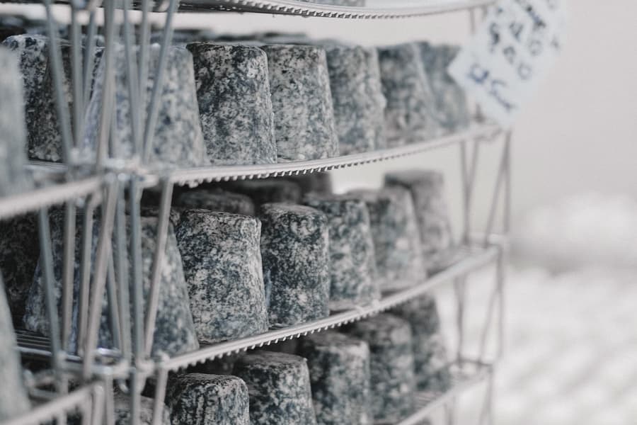Frost-covered stainless racking inside a chilled room
